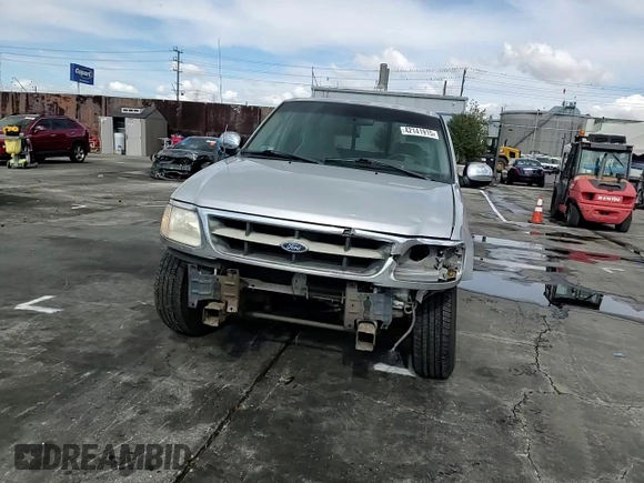 1998 Ford F-150 XL with VIN 1FTRX17L3WKB36791, listed as a Copart auction lot 42141915 with 201,067 mi miles and Salvage title. Bid and sale history available at DreamBid. Image 11.