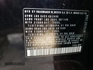 2018 Volkswagen Tiguan SEL z VIN 3VV2B7AX7JM119297, wystawiony jako Copart lot #54416195 z przebiegiem 51 972 mil mil oraz Szkoda całkowita • Salvage title. Historia ofert i sprzedaży dostępna na DreamBid. Obrazek 13.