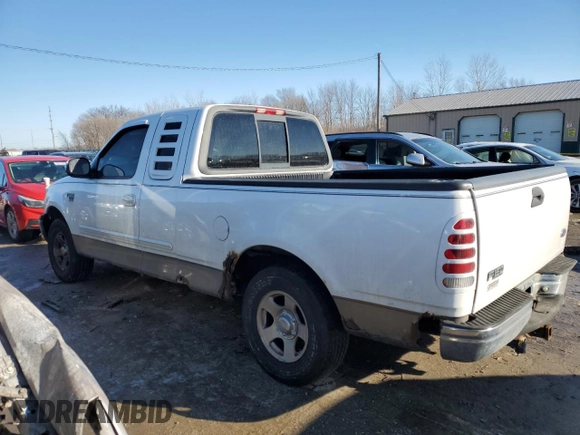 2002 Ford F-150 XL with VIN 1FTRX17L52NA26169, listed as a Copart auction lot 88756715 with 114,841 mi miles and Salvage title. Bid and sale history available at DreamBid. Image 2.