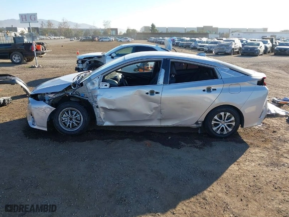 2021 Toyota Prius Prime LE with VIN JTDKAMFP1M3178179, listed as a IAAI auction lot 41233411 with 83,035 mi miles. Bid and sale history available at carsss.com. Image 15.