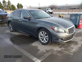 2013 Infiniti M37 with VIN JN1BY1AP8DM513615, listed as a IAAI auction lot 41572602 with 96,950 mi miles. Bid and sale history available at carsss.com. Image 1.