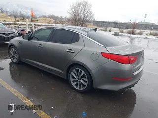 2015 Kia Optima SX Turbo with VIN 5XXGR4A66FG361755, listed as a IAAI auction lot 41199887 with 114,179 mi miles. Bid and sale history available at carsss.com. Image 3.