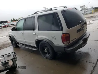 2000 Ford Explorer XLT z VIN 1FMZU73E2YZB82279, wystawiony jako Copart lot #86607864 z przebiegiem 46 620 mil mil oraz Szkody całkowita. Historia ofert i sprzedaży dostępna na DreamBid. Obrazek 2.