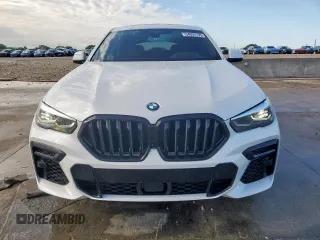 2023 BMW X6 xDrive40i z VIN 5UXCY6C08P9N43749, wystawiony jako Copart lot #54092795 z przebiegiem 39 495 mil mil oraz Szkody całkowita. Historia ofert i sprzedaży dostępna na DreamBid. Obrazek 5.