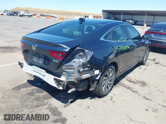 2022 Honda Insight Touring with VIN 19XZE4F90NE001251, listed as a IAAI auction lot 42303914 with 161,489 mi miles and . Bid and sale history available at DreamBid. Image 4.