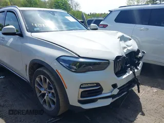 2019 BMW X5 xDrive40i with VIN 5UXCR6C56KLL09971, listed as a IAAI auction lot 42193031 with 94,463 mi miles and . Bid and sale history available at DreamBid. Image 6.