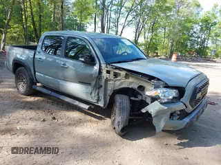 2022 Toyota Tacoma SR z VIN 3TMCZ5AN5NM518961, wystawiony jako IAAI lot #42148345 z przebiegiem 43 009 mil mil oraz . Historia ofert i sprzedaży dostępna na DreamBid. Obrazek 1.