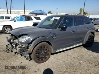 2018 MINI Countryman Cooper S with VIN WMZYT3C39J3E93214, listed as a Copart auction lot 77655444 with 101,401 mi miles and Salvage Title. Bid and sale history available at carsss.com. Image 1.