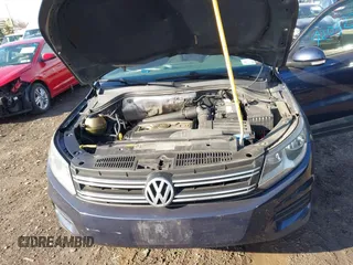 2014 Volkswagen Tiguan SE z VIN WVGAV3AX7EW541355, wystawiony jako IAAI lot #42032798 z przebiegiem 220 940 mil mil oraz . Historia ofert i sprzedaży dostępna na DreamBid. Obrazek 10.