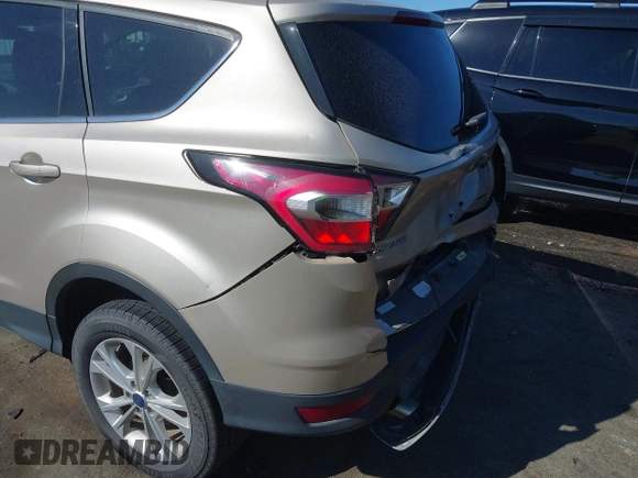 2017 Ford Escape SE with VIN 1FMCU9GD1HUC70823, listed as a IAAI auction lot 41898457 with 86,042 mi miles and . Bid and sale history available at DreamBid. Image 17.