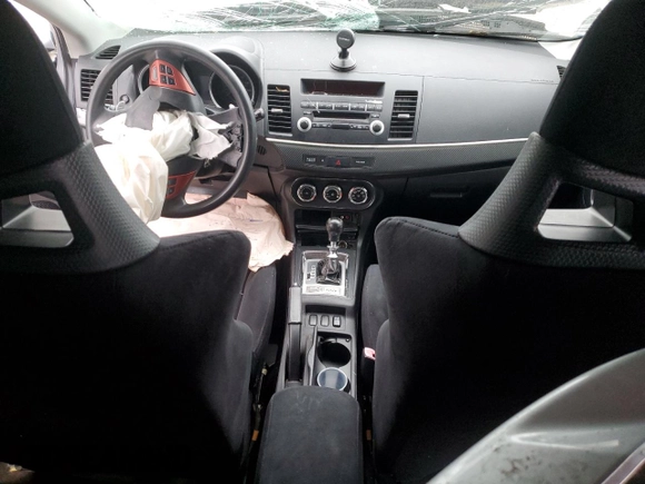 2010 Mitsubishi Lancer with VIN JA32Y6HV9AU002911, listed as a Copart auction lot 83633024 with Not Provided miles and Clean Title. Bid and sale history available at DreamBid. Image 8.