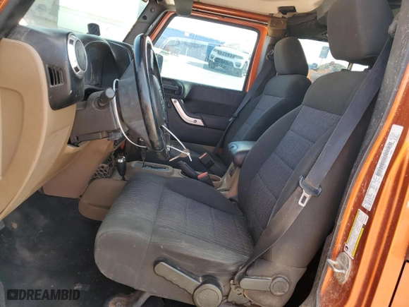 2011 Jeep Wrangler Unlimited Sahara with VIN 1J4BA5H19BL588797, listed as a Copart auction lot 72681904 with 100,763 mi miles and Salvage Title. Bid and sale history available at carsss.com. Image 7.