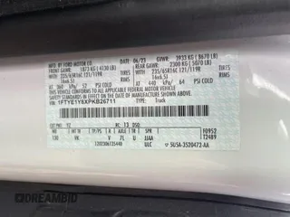 2023 Ford Transit Cargo with VIN 1FTYE1Y8XPKB26711, listed as a Copart auction lot 87334874 with 31,745 mi miles and Salvage Title. Bid and sale history available at DreamBid. Image 10.