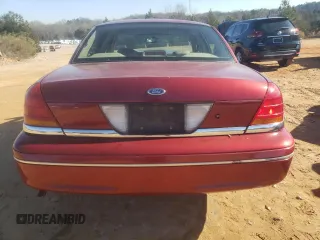 1998 Ford Crown Victoria LX с VIN 2FAFP74W3WX138757, выставлен на аукционе Copart как лот 87867945 с пробегом 148 827 миль миль и Списание • Salvage title. История ставок и продаж доступна на DreamBid. Изображение 6.