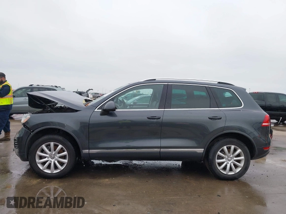 2012 Volkswagen Touareg Sport with VIN WVGEF9BP9CD008545, listed as a IAAI auction lot 41492653 with 138,424 mi miles and . Bid and sale history available at DreamBid. Image 15.