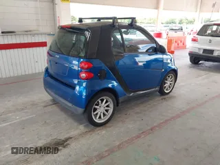 2008 Smart fortwo Pure with VIN WMEEJ31X28K123879, listed as a IAAI auction lot 42258663 with 93,056 mi miles and . Bid and sale history available at DreamBid. Image 4.
