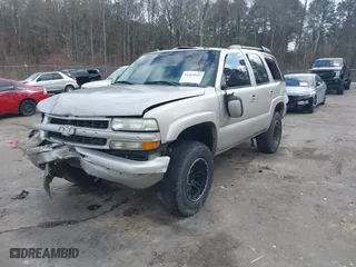 2005 Chevrolet Tahoe Z71 with VIN 1GNEK13T05R246648, listed as a IAAI auction lot 41483045 with 312,536 mi miles. Bid and sale history available at carsss.com. Image 2.