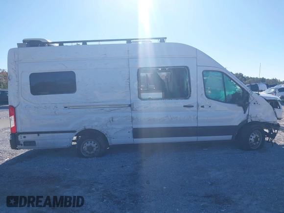 2022 Ford Transit Cargo with VIN 1FTBW3U85NKA01097, listed as a IAAI auction lot 41076643 with 24,786 mi miles and . Bid and sale history available at DreamBid. Image 6.