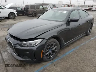 2022 BMW i4 eDrive40 with VIN WBY73AW06NFN08995, listed as a Copart auction lot 87086344 with 14,059 mi miles and Salvage Title. Bid and sale history available at carsss.com. Image 1.
