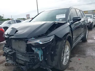 2023 Cadillac XT6 FWD Luxury z VIN 1GYKPAR43PZ147512, wystawiony jako IAAI lot #42175720 z przebiegiem 31 520 mil mil oraz . Historia ofert i sprzedaży dostępna na DreamBid. Obrazek 2.