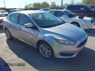 2016 Ford Focus SE with VIN 1FADP3F28GL389377, listed as a IAAI auction lot 42135996 with 172,278 mi miles. Bid and sale history available at carsss.com. Image 1.