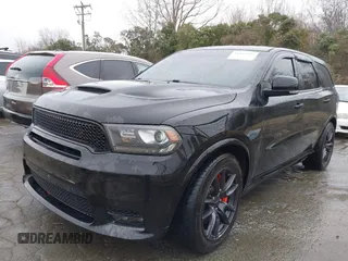 2019 Dodge Durango SRT with VIN 1C4SDJGJXKC550910, listed as a IAAI auction lot 41497932 with 62,541 mi miles and . Bid and sale history available at DreamBid. Image 2.