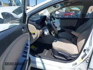 2015 Hyundai Accent GLS with VIN KMHCT4AEXFU922052, listed as a IAAI auction lot 41986823 with 106,134 mi miles and . Bid and sale history available at DreamBid. Image 5.