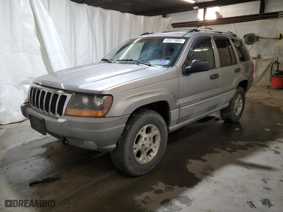 1999 Jeep Grand Cherokee Laredo with VIN 1J4GW58N0XC686845, listed as a Copart auction lot 48877805 with 155,908 mi miles and Clean Title. Bid and sale history available at carsss.com. Image 1.