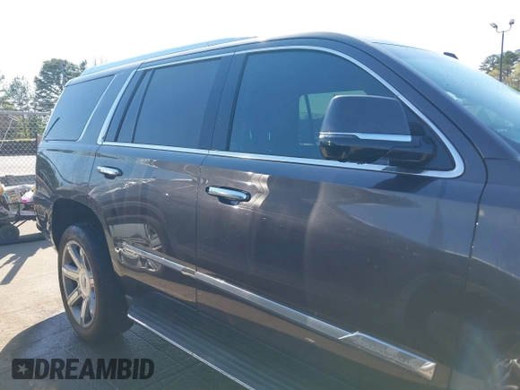2015 Cadillac Escalade Luxury z VIN 1GYS3MKJ2FR518865, wystawiony jako IAAI lot #41890235 z przebiegiem 156 849 mil mil oraz . Historia ofert i sprzedaży dostępna na DreamBid. Obrazek 14.