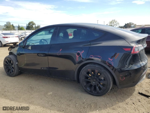 2022 Tesla Model Y Long Range with VIN 7SAYGDEE2NF575433, listed as a Copart auction lot 47576175 with 53,642 mi miles and Salvage Title. Bid and sale history available at carsss.com. Image 2.