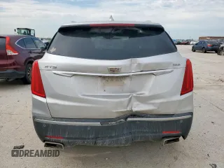 2017 Cadillac XT5 Luxury FWD with VIN 1GYKNBRS8HZ221244, listed as a Copart auction lot 55316055 with 101,330 mi miles and Salvage title. Bid and sale history available at DreamBid. Image 6.