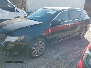 2013 Lincoln MKT with VIN 2LMHJ5FK9DBL56134, listed as a IAAI auction lot 41003176 with 292,292 mi miles and . Bid and sale history available at DreamBid. Image 2.