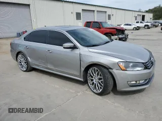 2014 Volkswagen Passat SEL Premium z VIN 1VWCN7A35EC073576, wystawiony jako Copart lot #52810825 z przebiegiem 113 067 mil mil oraz Szkoda całkowita • Salvage title. Historia ofert i sprzedaży dostępna na DreamBid. Obrazek 4.