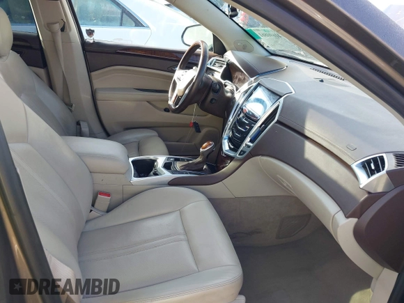 2014 Cadillac SRX Luxury Collection with VIN 3GYFNBE35ES658546, listed as a IAAI auction lot 41690861 with 66,263 mi miles. Bid and sale history available at carsss.com. Image 5.