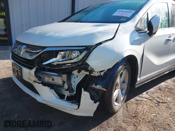 2019 Honda Odyssey EX-L with VIN 5FNRL6H74KB015835, listed as a IAAI auction lot 42044603 with 109,740 mi miles. Bid and sale history available at carsss.com. Image 6.