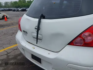 2012 Nissan Versa S z VIN 3N1BC1CP2CK299490, wystawiony jako IAAI lot #42259931 z przebiegiem 200 613 mil mil oraz . Historia ofert i sprzedaży dostępna na DreamBid. Obrazek 12.