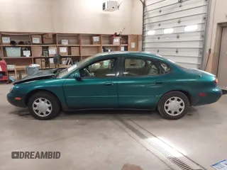 1996 Ford Taurus GL z VIN 1FALP52U5TG110582, wystawiony jako IAAI lot #40858639 z przebiegiem 57 965 mil mil oraz . Historia ofert i sprzedaży dostępna na DreamBid. Obrazek 14.
