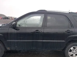 2009 Kia Sportage LX with VIN KNDJE723497612745, listed as a IAAI auction lot 41974301 with 141,110 mi miles and . Bid and sale history available at carsss.com. Image 14.