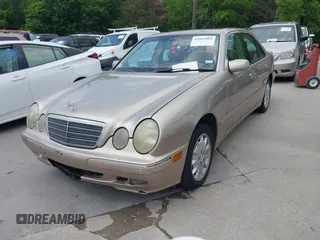 2000 Mercedes-Benz E-Class with VIN WDBJF82JXYX035704, listed as a IAAI auction lot 42045969 with 1 mi miles. Bid and sale history available at carsss.com. Image 2.