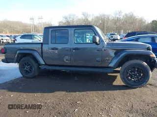 2022 Jeep Gladiator Texas Trail with VIN 1C6HJTAG7NL141819, listed as a IAAI auction lot 41520083 with 21,191 mi miles and . Bid and sale history available at DreamBid. Image 13.