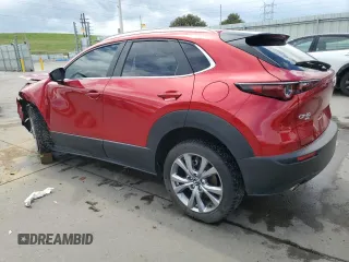 2023 Mazda CX-30 S Carbon Edition with VIN 3MVDMBCM7PM551693, listed as a Copart auction lot 60330865 with 22,557 mi miles and Salvage title. Bid and sale history available at DreamBid. Image 2.