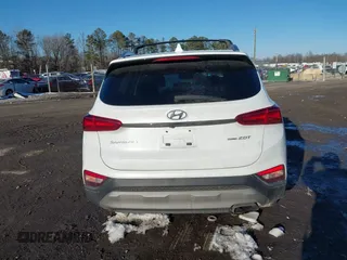 2020 Hyundai Santa Fe Limited with VIN 5NMS5CAA1LH261760, listed as a IAAI auction lot 41293649 with 119,153 mi miles. Bid and sale history available at carsss.com. Image 16.