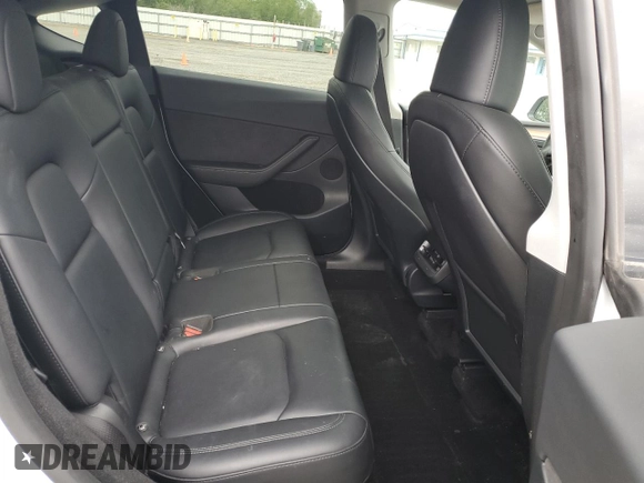 2023 Tesla Model Y Long Range z VIN 7SAYGDEE3PF751019, wystawiony jako Copart lot #57972885 z przebiegiem 24 591 mil mil oraz Szkoda całkowita • Salvage title. Historia ofert i sprzedaży dostępna na DreamBid. Obrazek 11.