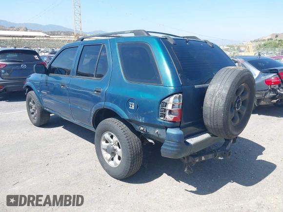 1998 Isuzu Rodeo S z VIN 4S2CM58W8W4328196, wystawiony jako IAAI lot #42323556 z przebiegiem 272 915 mil mil oraz . Historia ofert i sprzedaży dostępna na DreamBid. Obrazek 3.