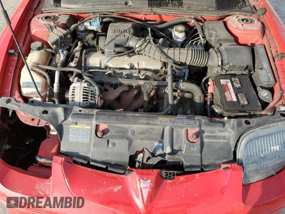 2002 Pontiac Sunfire SE z VIN 1G2JB124327292861, wystawiony jako Copart lot #78462994 z przebiegiem 90 454 mil mil oraz Szkoda całkowita • Salvage title. Historia ofert i sprzedaży dostępna na DreamBid. Obrazek 13.