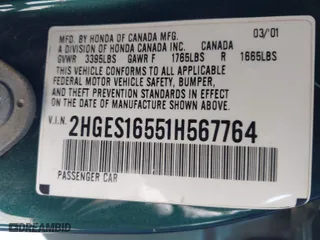 2001 Honda Civic LX with VIN 2HGES16551H567764, listed as a IAAI auction lot 41908288 with 137,740 mi miles. Bid and sale history available at carsss.com. Image 9.