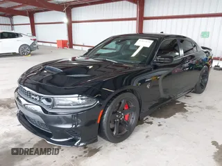 2019 Dodge Charger SRT Hellcat with VIN 2C3CDXL97KH552439, listed as a IAAI auction lot 41813879 with 58,921 mi miles and . Bid and sale history available at DreamBid. Image 2.
