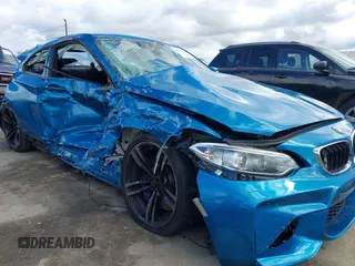 2017 BMW M2 z VIN WBS1H9C53HV887089, wystawiony jako IAAI lot #41731841 z przebiegiem 57 509 mil mil oraz . Historia ofert i sprzedaży dostępna na DreamBid. Obrazek 6.