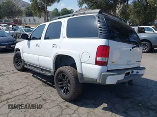 2004 Chevrolet Tahoe Z71 z VIN 1GNEK13Z04R258348, wystawiony jako IAAI lot #42371719 z przebiegiem 125 457 mil mil oraz . Historia ofert i sprzedaży dostępna na DreamBid. Obrazek 3.