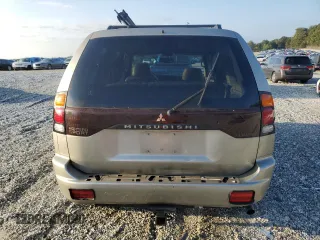 2002 Mitsubishi Montero Limited z VIN JA4LS41R32J066917, wystawiony jako Copart lot #71118894 z przebiegiem 185 475 mil mil oraz Szkody całkowita. Historia ofert i sprzedaży dostępna na DreamBid. Obrazek 6.